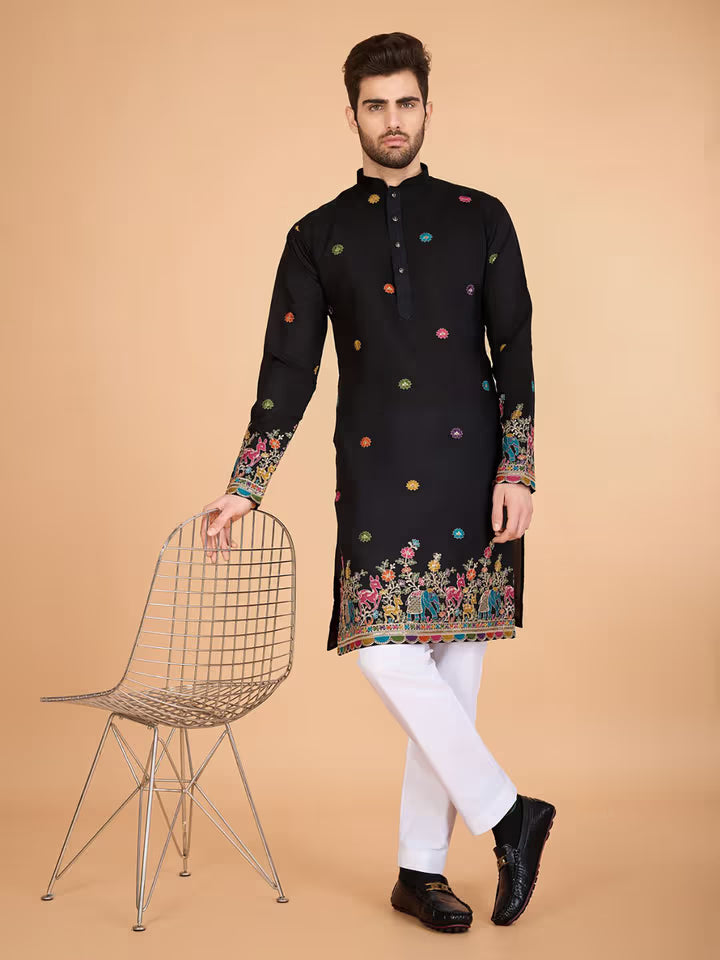 Men’s black kurta with colorful embroidery and festive border – ethnic wear for weddings and celebrations