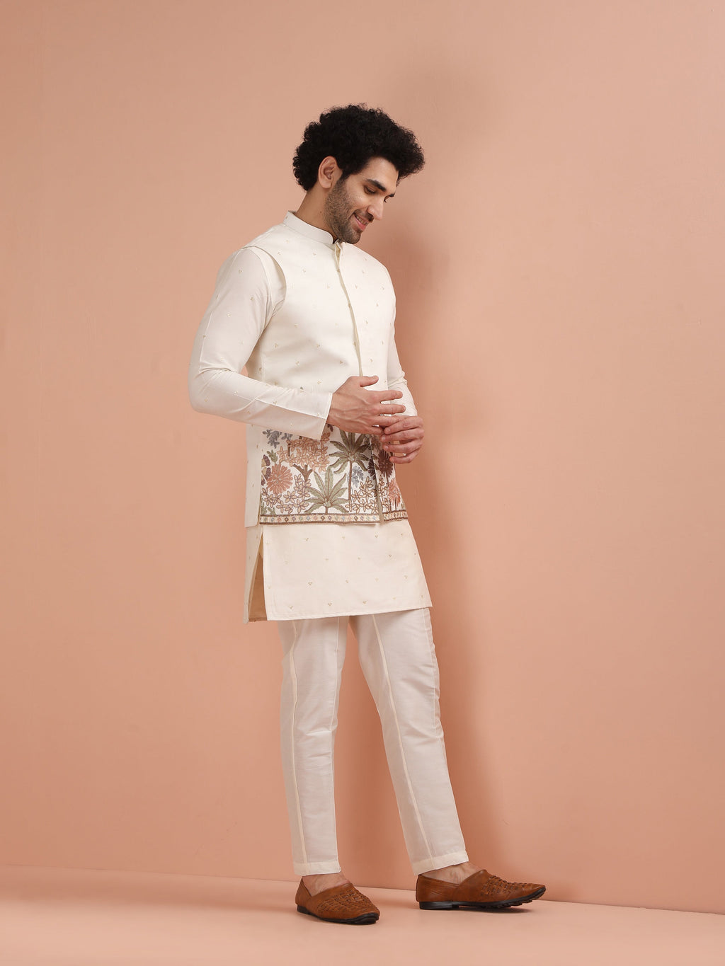 Ivory embroidered sadri for men with palm and floral threadwork, perfect for weddings and traditional occasions.