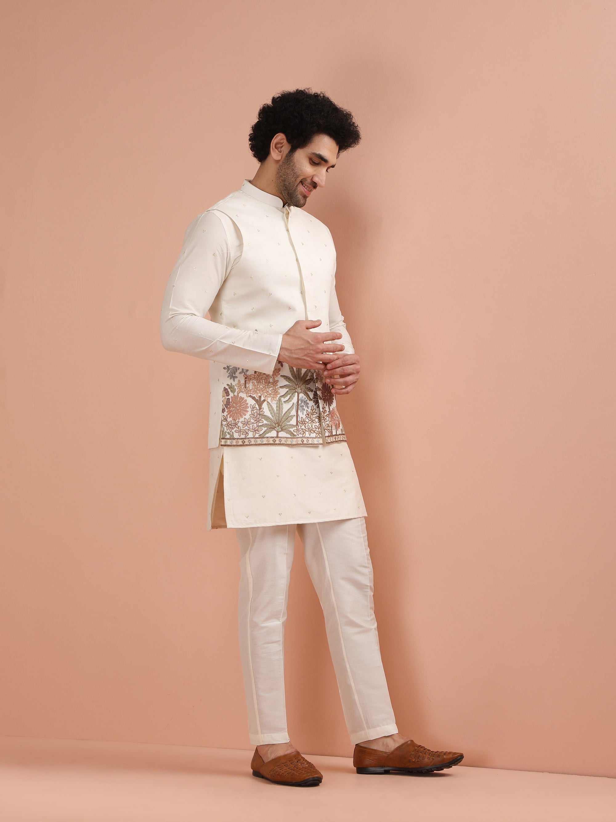 Ivory embroidered sadri for men with palm and floral threadwork, perfect for weddings and traditional occasions.