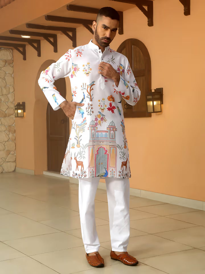 Men’s white kurta with printed monument, peacock, and floral designs – ethnic wear for festive and wedding occasions