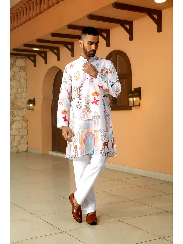 Men’s white kurta with printed monument, peacock, and floral designs – ethnic wear for festive and wedding occasions